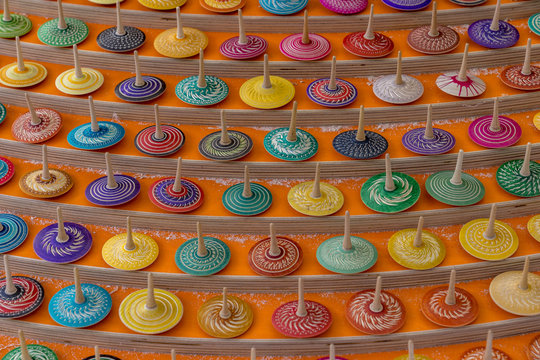 Many colorful wooden fidged spinners waiting for the buyer