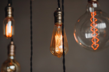Set edison retro lamp on loft gray concrete background.