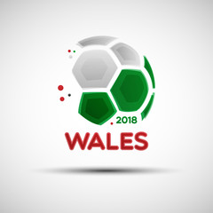 Fototapeta premium Abstract soccer ball with Welsh national flag colors