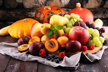 Fresh summer fruits with apple, grapes, berries, pear and apricot