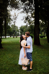 Fototapeta premium Pretty couple in the forest at summer 