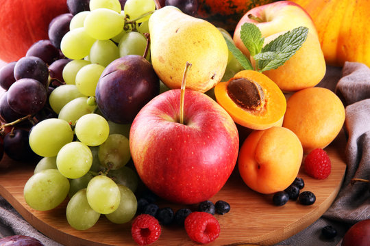 Fresh summer fruits with apple, grapes, berries, pear and apricot