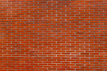 Background of red bricks with cement