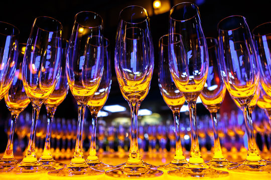 A row of empty champagne glasses