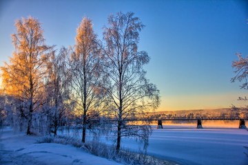 Winter landscape and a railway bridge in Norway.