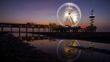 ferris wheel at sunset in the netherlands