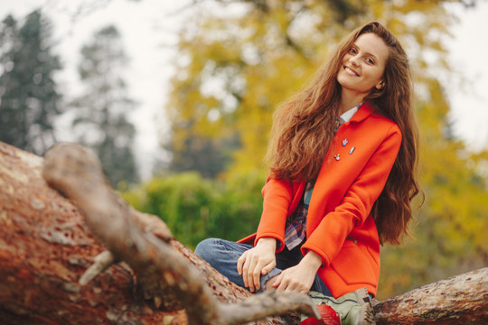 Smiling girl autumn portrait.