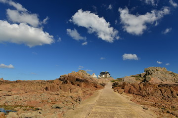 Corbiere, Jersey, U.K.
Beach at low tide and dramatic sky, with fishermen cottages and the lighthouse keepers house in the middle,