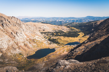 An alpine lake seen from mountains near Mount Evans in Colorado. 