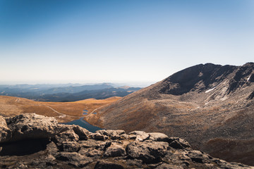 Landscape view of the lake at the base of Mount Evans in Colorado. 