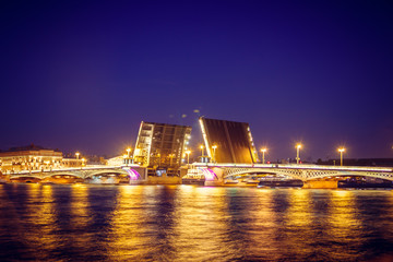 Fototapeta na wymiar Divorce of bridges in St. Petersburg. Night city of Russia. The Neva River