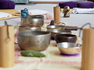 Set up for sound healing with singing bowls and a koshi chime