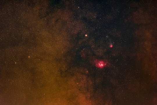 The central part of the Milky Way with the Lagoon Nebula and the Trifid Nebula in the constellation Sagittarius as seen from Mannheim in Germany.