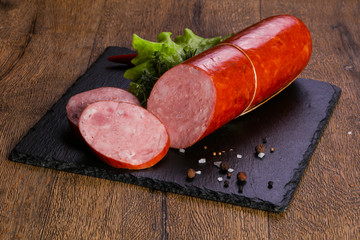 Pork sausages over wooden