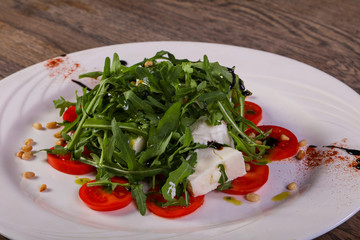Caprese salad with arugula