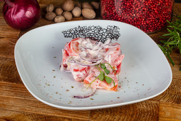 Delicious tomatoes with onios