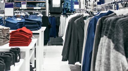 The interior of the men's clothing store, jeans, jackets, T-shirts.