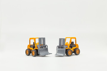 Orange toy construction machines