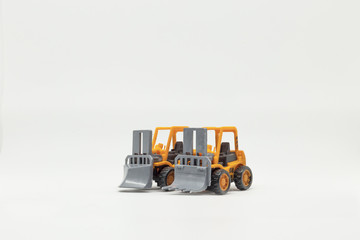 Orange toy construction machines