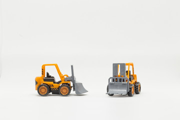 Orange toy construction machines