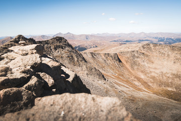 Landscape view of the Rocky Mountains from the top of Mount Evans in Colorado. 