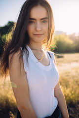 Close-up candid portrait of happy young woman