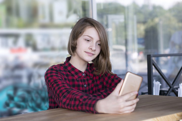 Concentrated girl posing outdoors