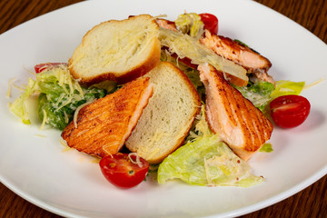 Caesar salad with salmon