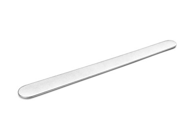 Tongue depressor on white background. Medical tool