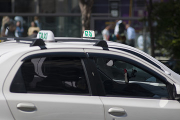 two taxis side by side