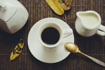 still life with black coffee on a dark background