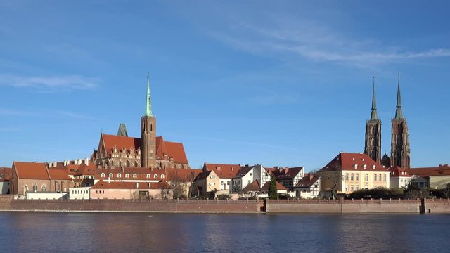 View at Tumski island and Cathedral of St John the Baptist with bridge through river Odra in Wroclaw, Poland