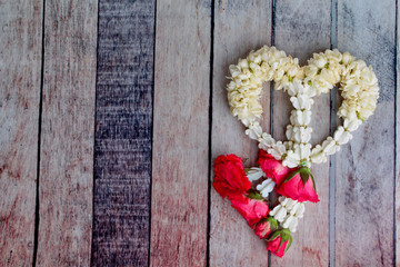 Isolated of  garland,lei of flowers,to worship of the virtues with  red rose and white crown flower