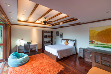 Luxury Interior design in bedroom of pool villa with cozy king bed.high raised ceiling , home, house