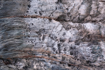 The texture of the natural porous stone is gray-lilac.
