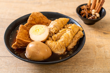 hard-boiled egg in brown sauce or sweet gravy