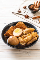 hard-boiled egg in brown sauce or sweet gravy