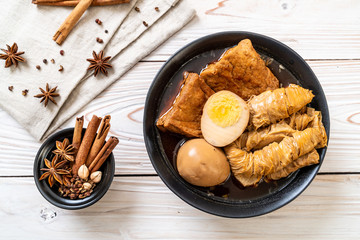 hard-boiled egg in brown sauce or sweet gravy