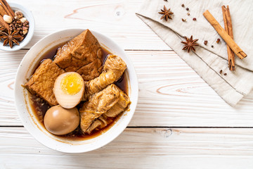 hard-boiled egg in brown sauce or sweet gravy