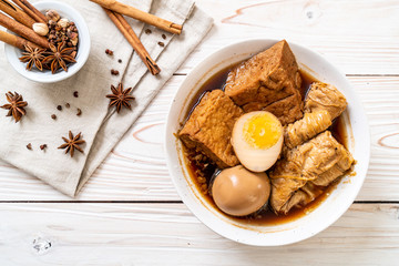 hard-boiled egg in brown sauce or sweet gravy