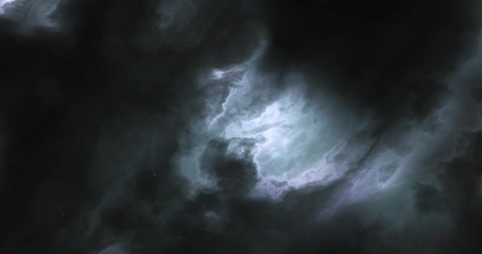 Fly through space nebulae and star field. Glowing clouds and dark dust. Green and blue hue.
