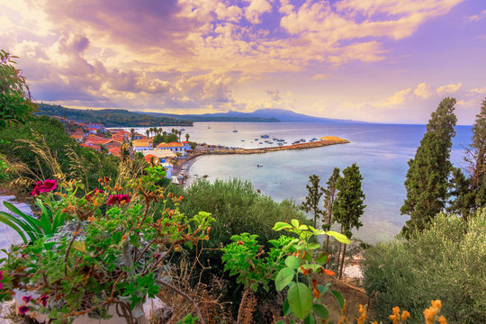 View of traditional fishing village of Koroni, Greece and its small harbour