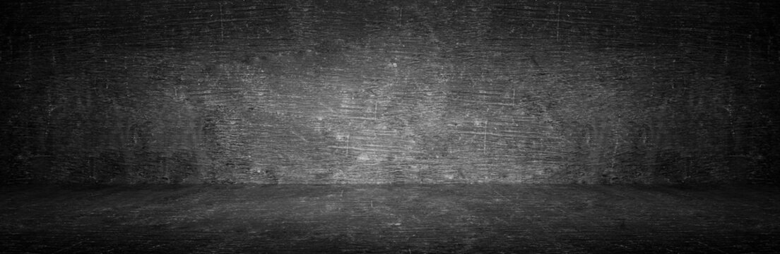 Blank wide screen Real chalkboard background texture in college concept for back to school panoramic wallpaper for black friday. Blackboard room floor round vignette.