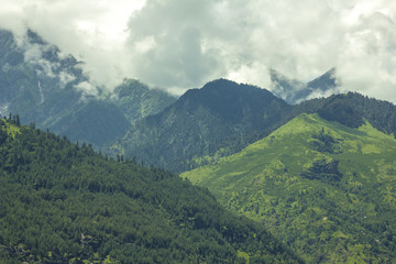 green hills in the mountain clouds