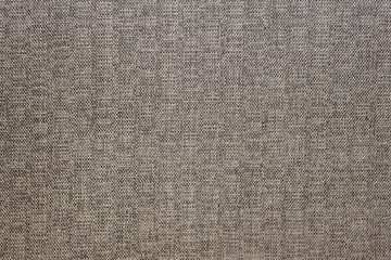 Fototapeta na wymiar Texture of gray coarse cloth