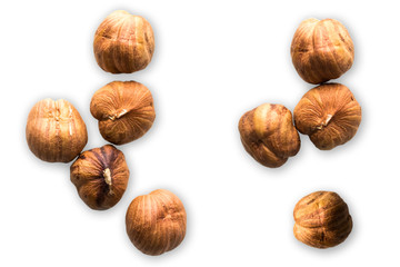 Hazelnuts isolated on white background. Creative concept of health and wellness. Nuts. Top view