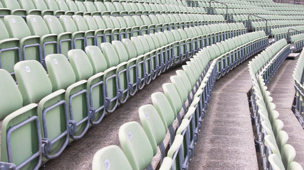   empty seats of an outdoor tribune