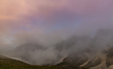 Dramatic clouds at sunset and beautiful light in the Dolomite Alps
