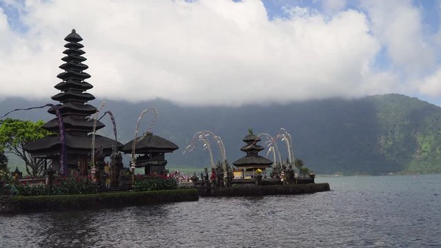 Hindu Temple Pura Ulun Danu Bratan, on Bratan lake. Balinese, old hindu architecture, Bali Architecture, Ancient design. 4K video. Travel concept.