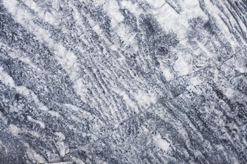 The texture of the magnesite stone. Gray stone background